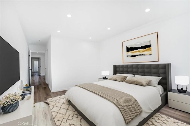 bedroom featuring light hardwood / wood-style floors