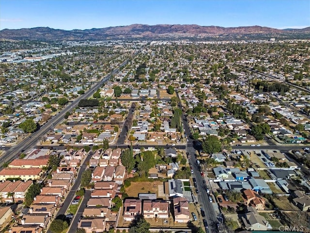 drone / aerial view featuring a mountain view