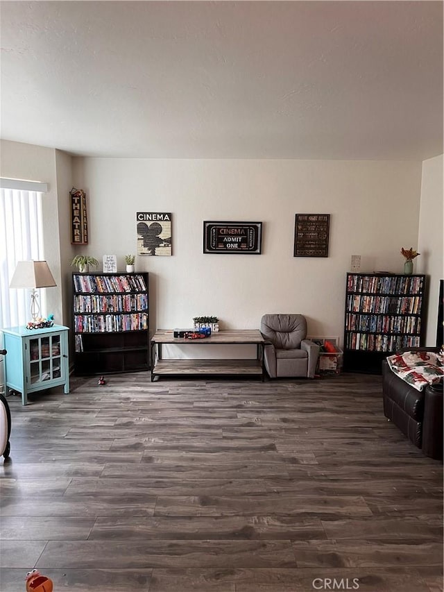 living area with dark hardwood / wood-style floors