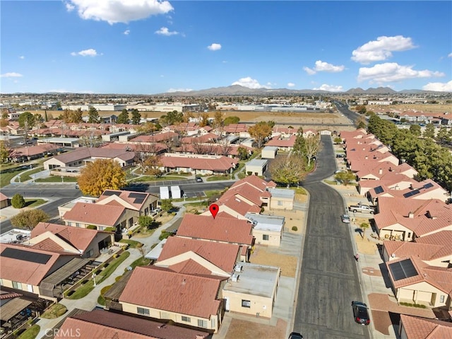 bird's eye view with a mountain view