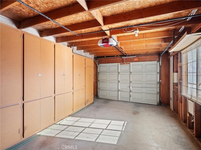 garage featuring a garage door opener