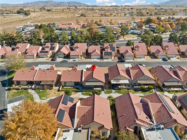 bird's eye view with a mountain view