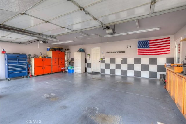 garage featuring a garage door opener