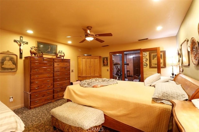 carpeted bedroom with ceiling fan