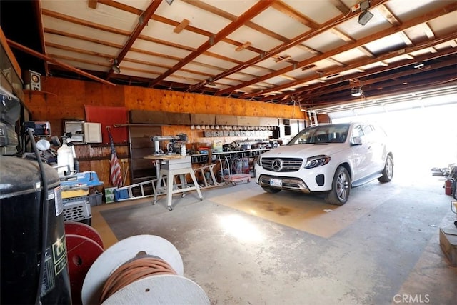 garage with a workshop area