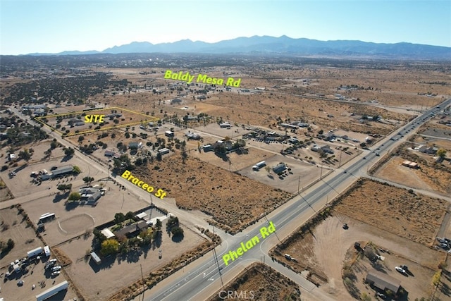 aerial view featuring a mountain view