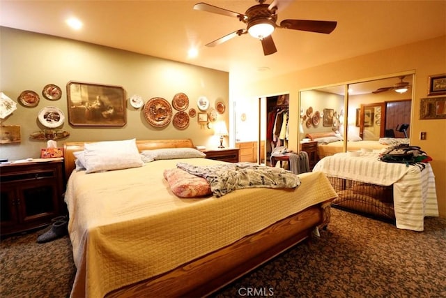 carpeted bedroom featuring a closet and ceiling fan