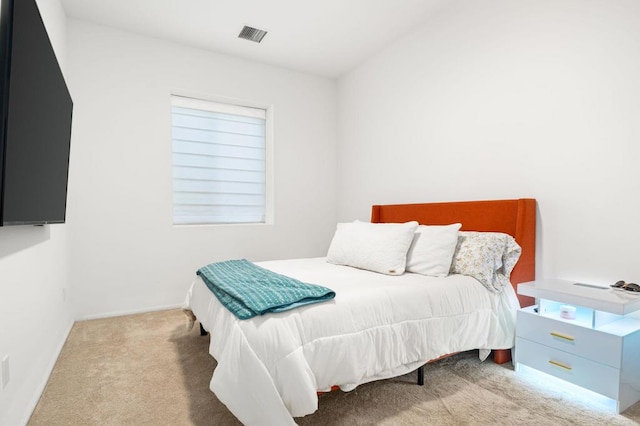 bedroom featuring carpet