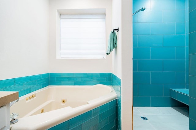 bathroom with vanity and plus walk in shower