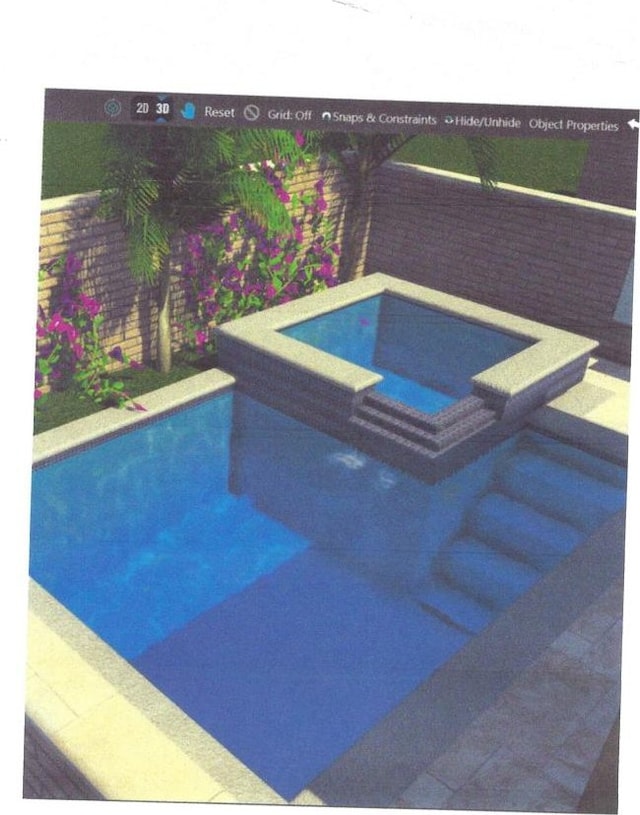 view of pool with an in ground hot tub