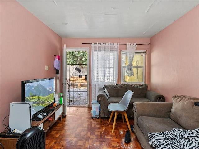 living room with dark parquet floors