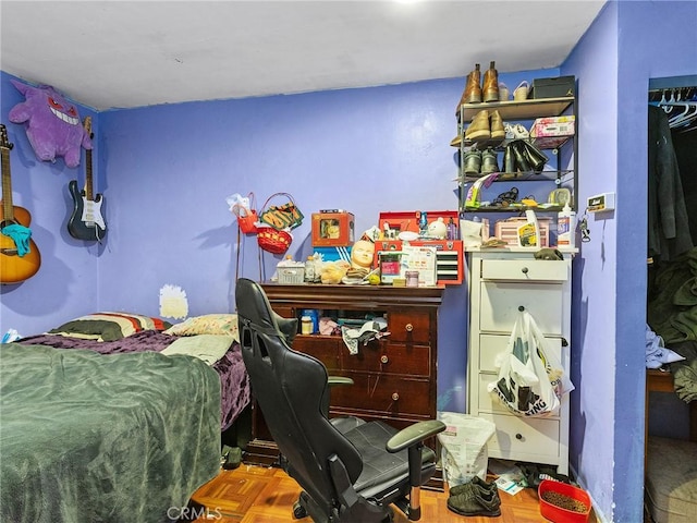 bedroom with parquet flooring