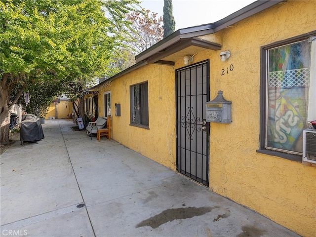 view of home's exterior with a patio area