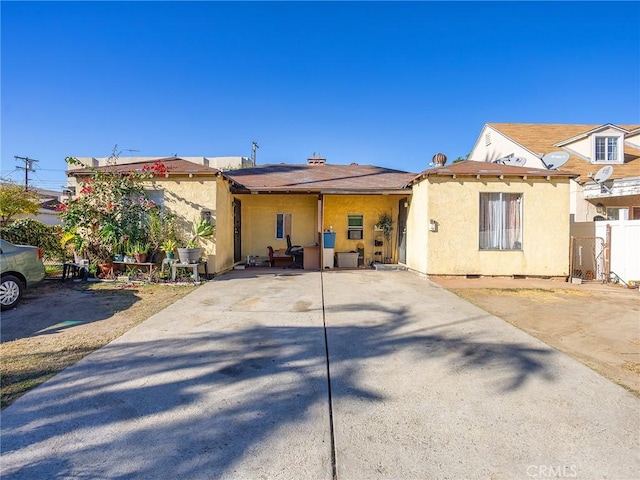 view of front of house with a patio area