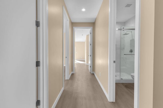 hall featuring light hardwood / wood-style floors