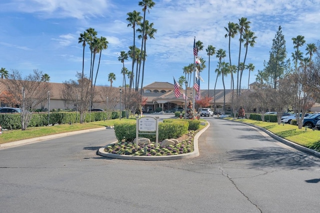 6141 Wingfoot Ave, Banning, CA 92220 - view of asphalt road featuring curbs