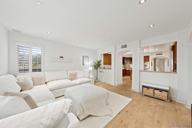 living room featuring light wood-type flooring