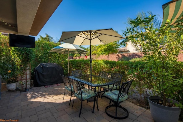 view of patio / terrace featuring a grill