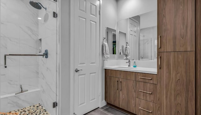 bathroom with vanity and walk in shower