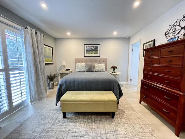 bedroom featuring light tile patterned floors