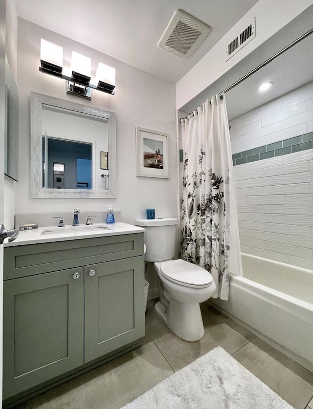 full bathroom with toilet, vanity, shower / tub combo, and tile patterned flooring