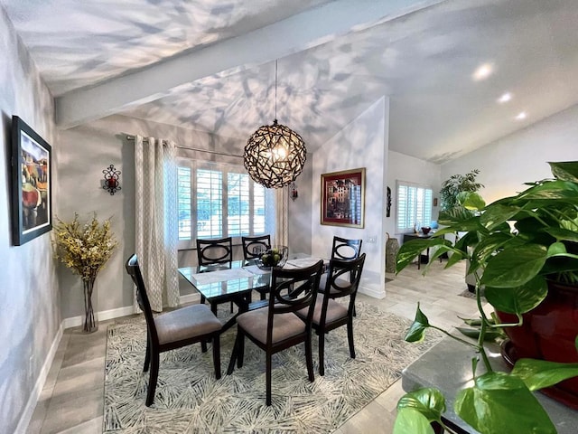 dining area with vaulted ceiling