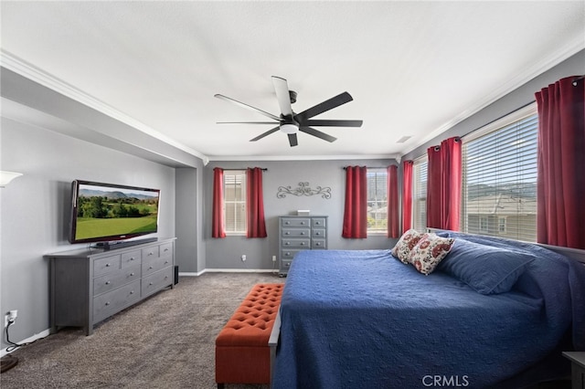 carpeted bedroom with ceiling fan and crown molding