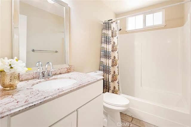 full bathroom featuring toilet, vanity, tile patterned floors, and shower / bath combination with curtain