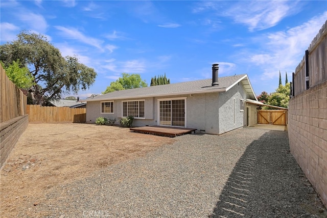 back of property featuring a patio area