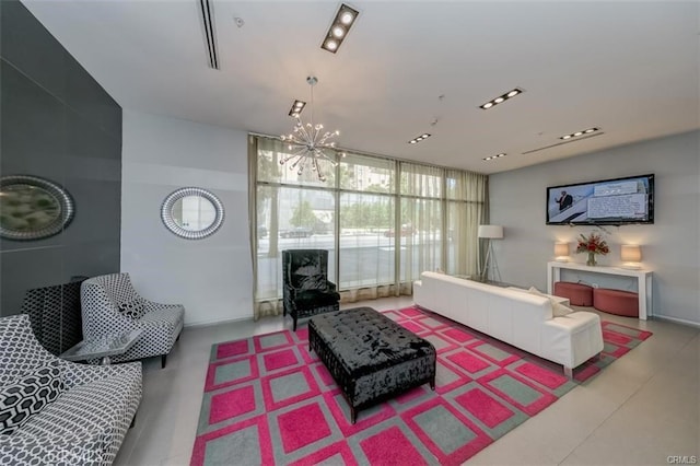 living room with floor to ceiling windows and a chandelier