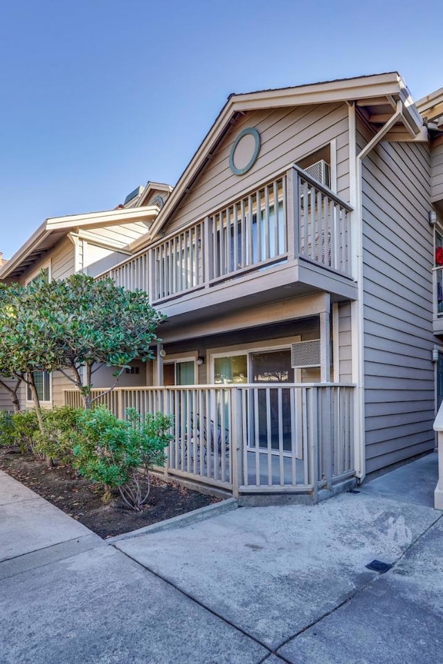 exterior space featuring a balcony