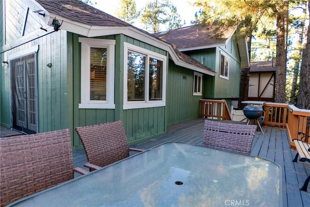 wooden terrace with grilling area