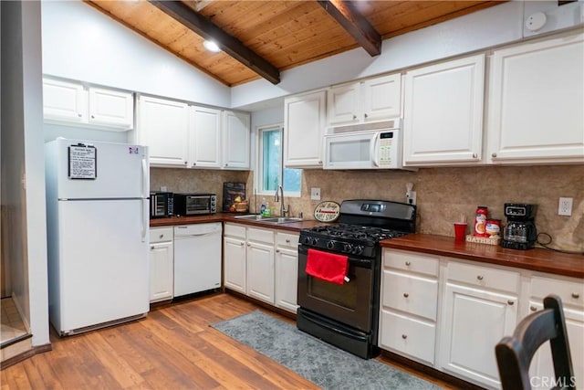 kitchen featuring sink, vaulted ceiling with beams, wooden ceiling, white appliances, and light hardwood / wood-style floors