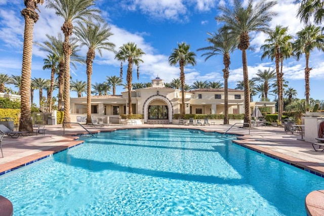 view of pool featuring a patio