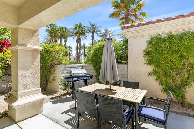 view of patio with a grill