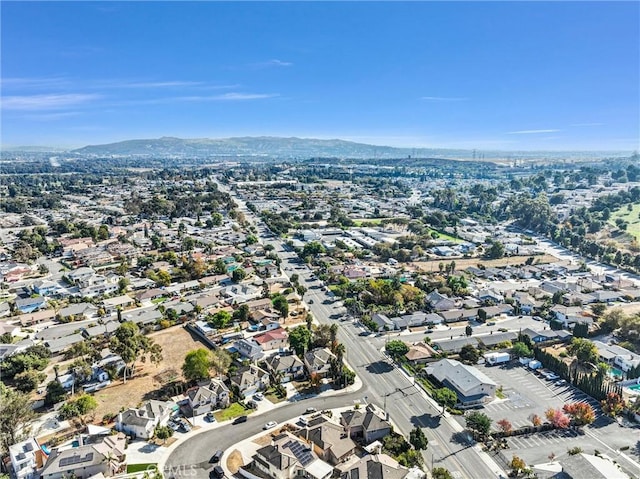 drone / aerial view featuring a mountain view