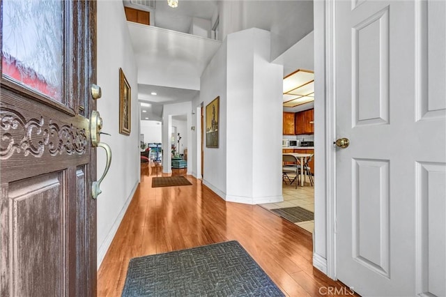 foyer featuring light wood-type flooring