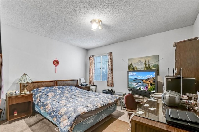 carpeted bedroom with a textured ceiling