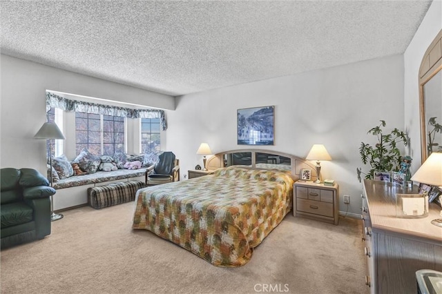 carpeted bedroom with a textured ceiling