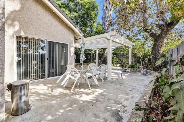 view of patio featuring a pergola