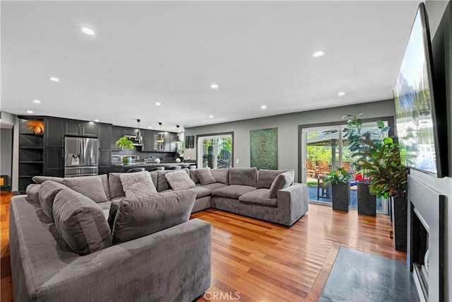 living room with light hardwood / wood-style floors