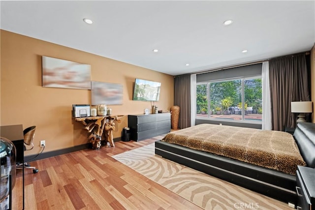 bedroom with light wood-type flooring