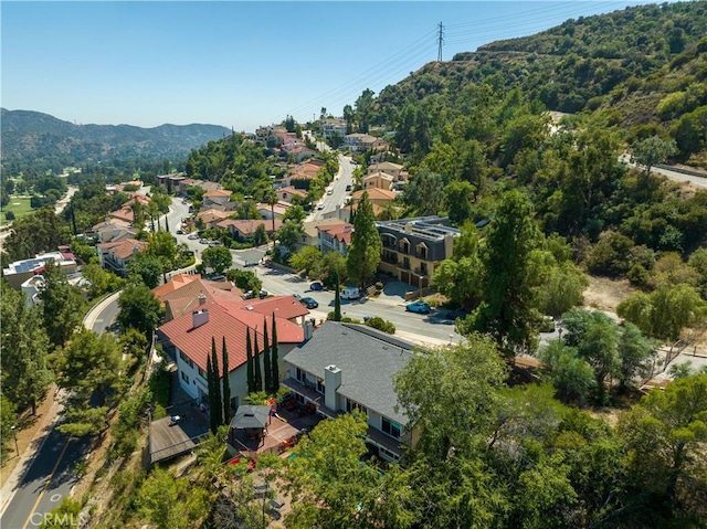 drone / aerial view featuring a mountain view