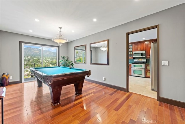 rec room featuring light hardwood / wood-style flooring and pool table