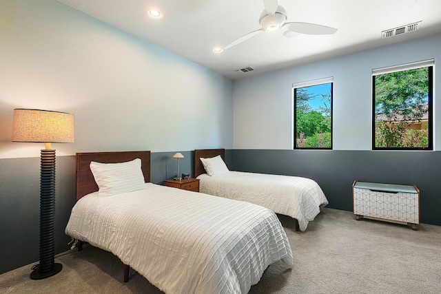 bedroom featuring carpet and ceiling fan