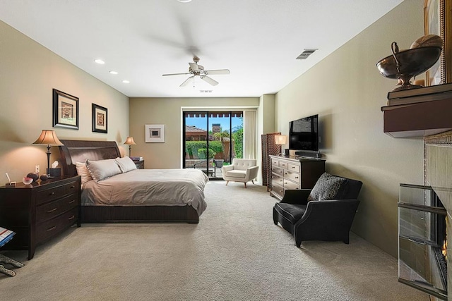 bedroom with light carpet, access to outside, and ceiling fan