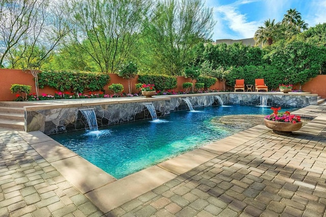 view of pool featuring pool water feature