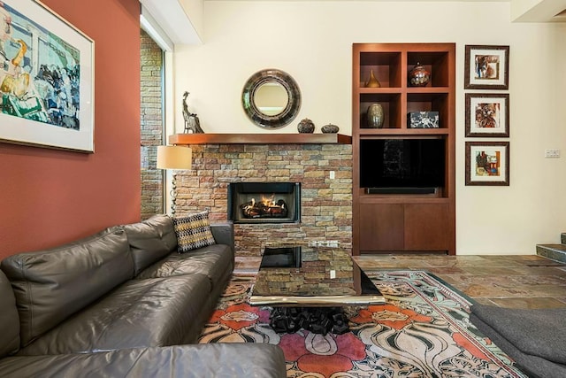 living room featuring a fireplace