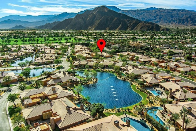 aerial view with a water and mountain view