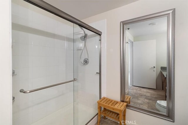 bathroom featuring an enclosed shower